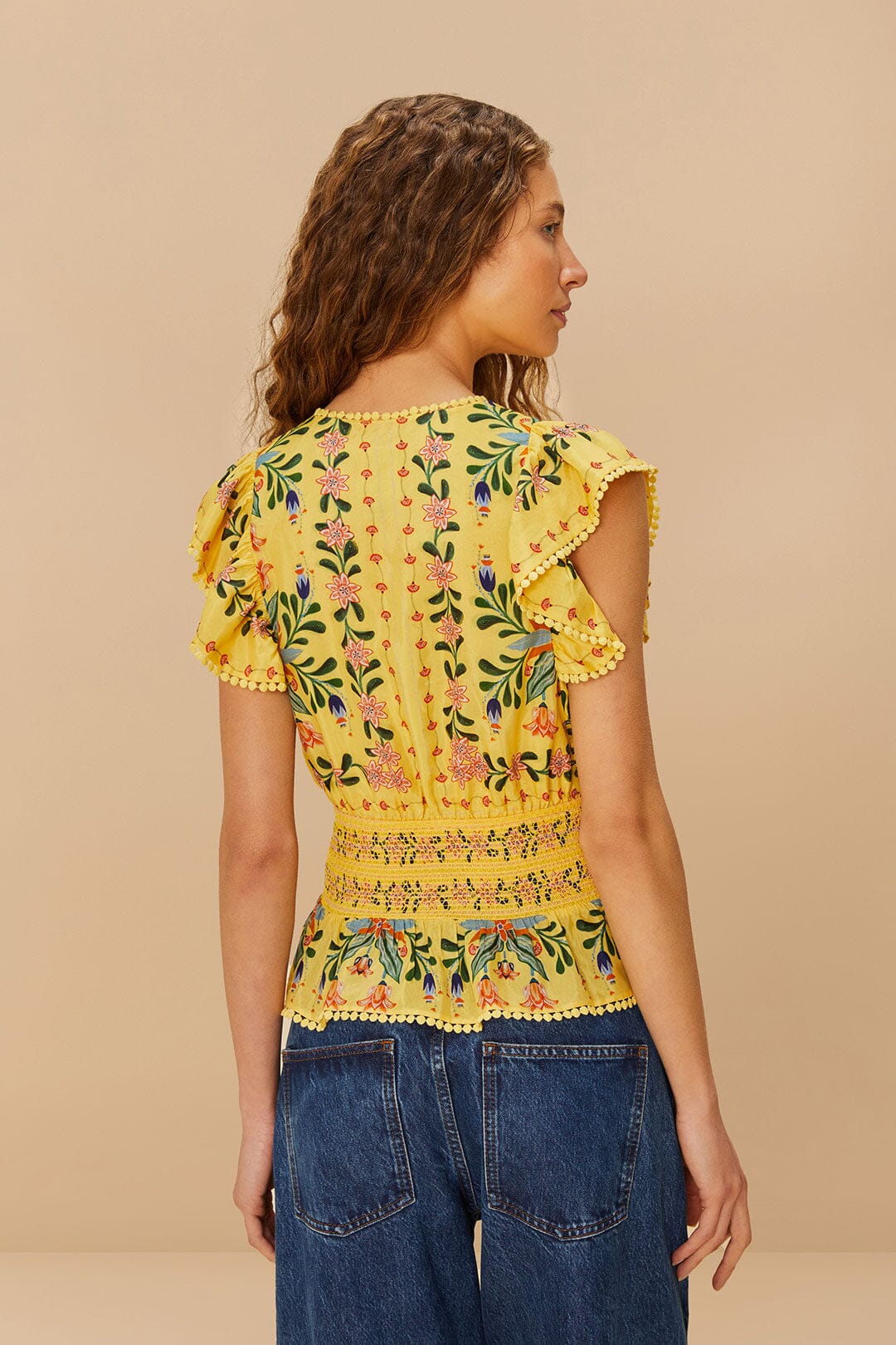 Blusa estampada de rayas y delicadas flores amarillas