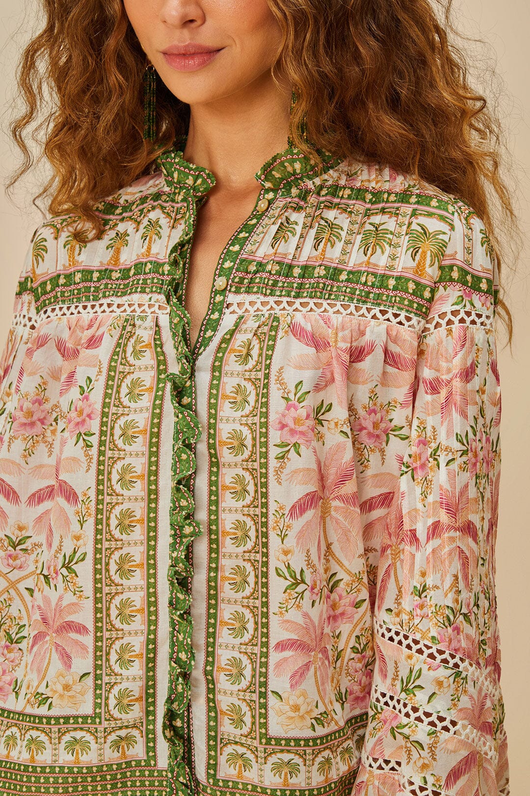 Blusa de palma blanca
