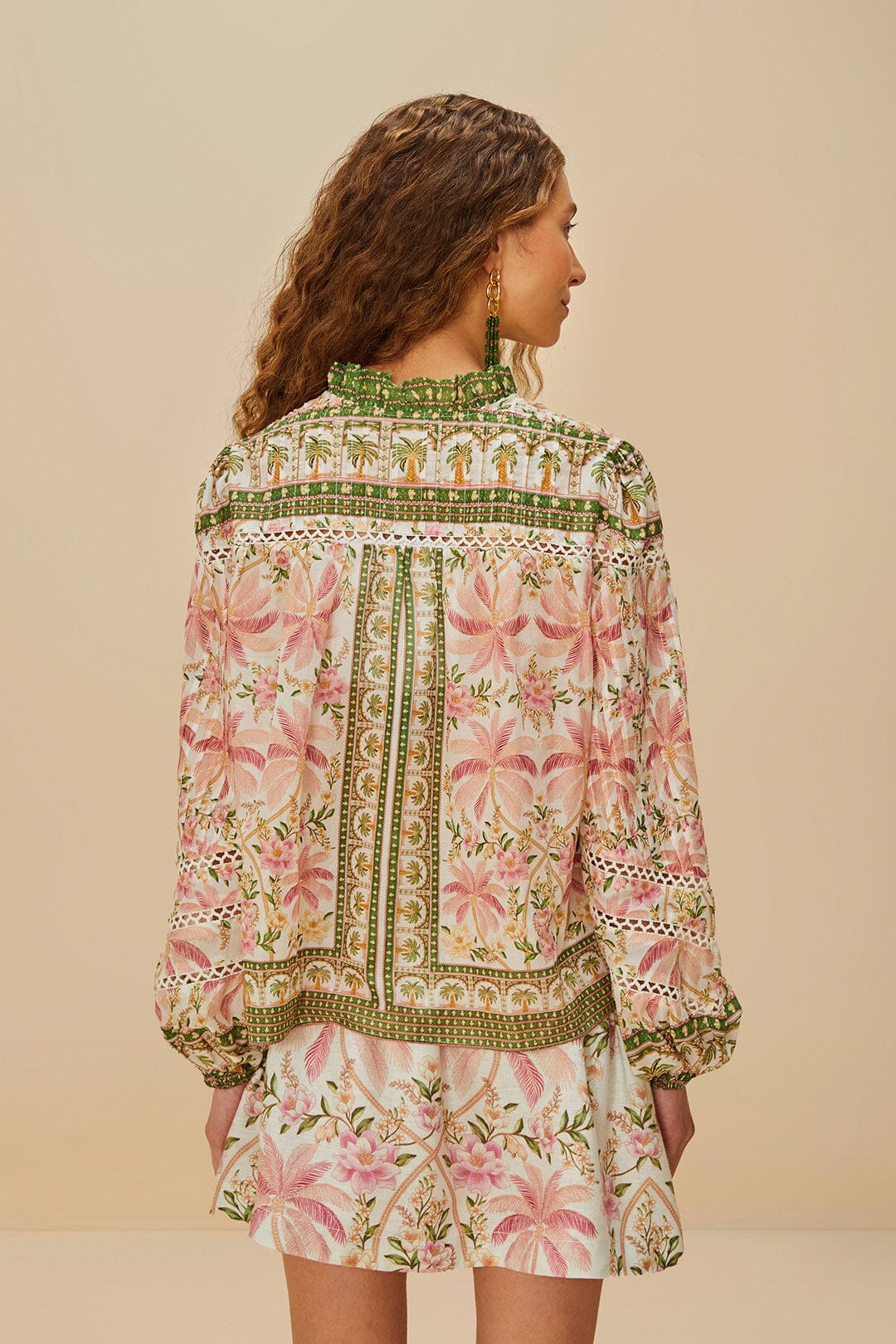 Blusa de palma blanca
