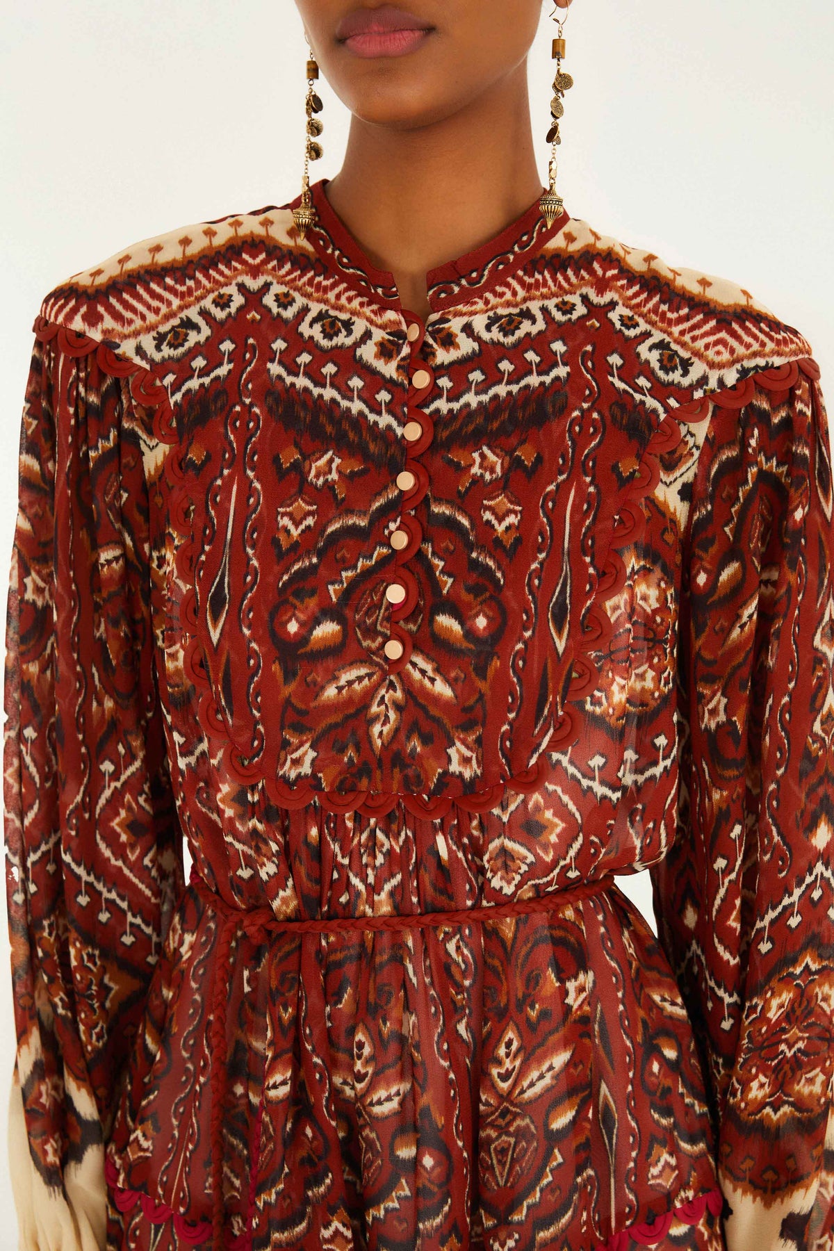 FARM Rio model wearing the Sand Ainika Pineapple Tapestry Long Sleeve Mini Dress