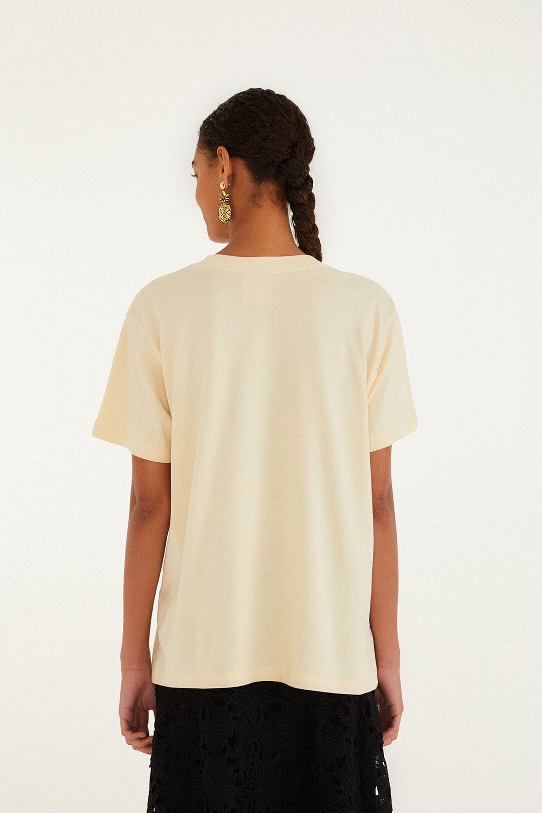 FARM Rio model wearing the Sand Feminist Organic Cotton Relaxed T-Shirt