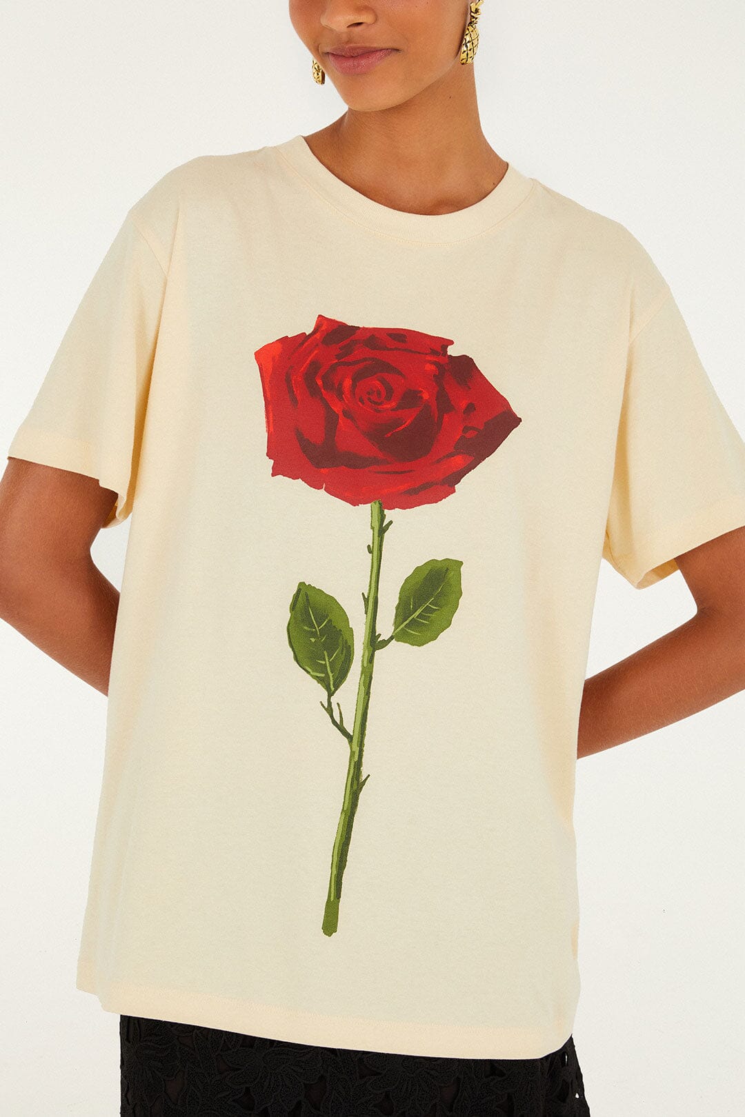 FARM Rio model wearing the Sand Feminist Organic Cotton Relaxed T-Shirt