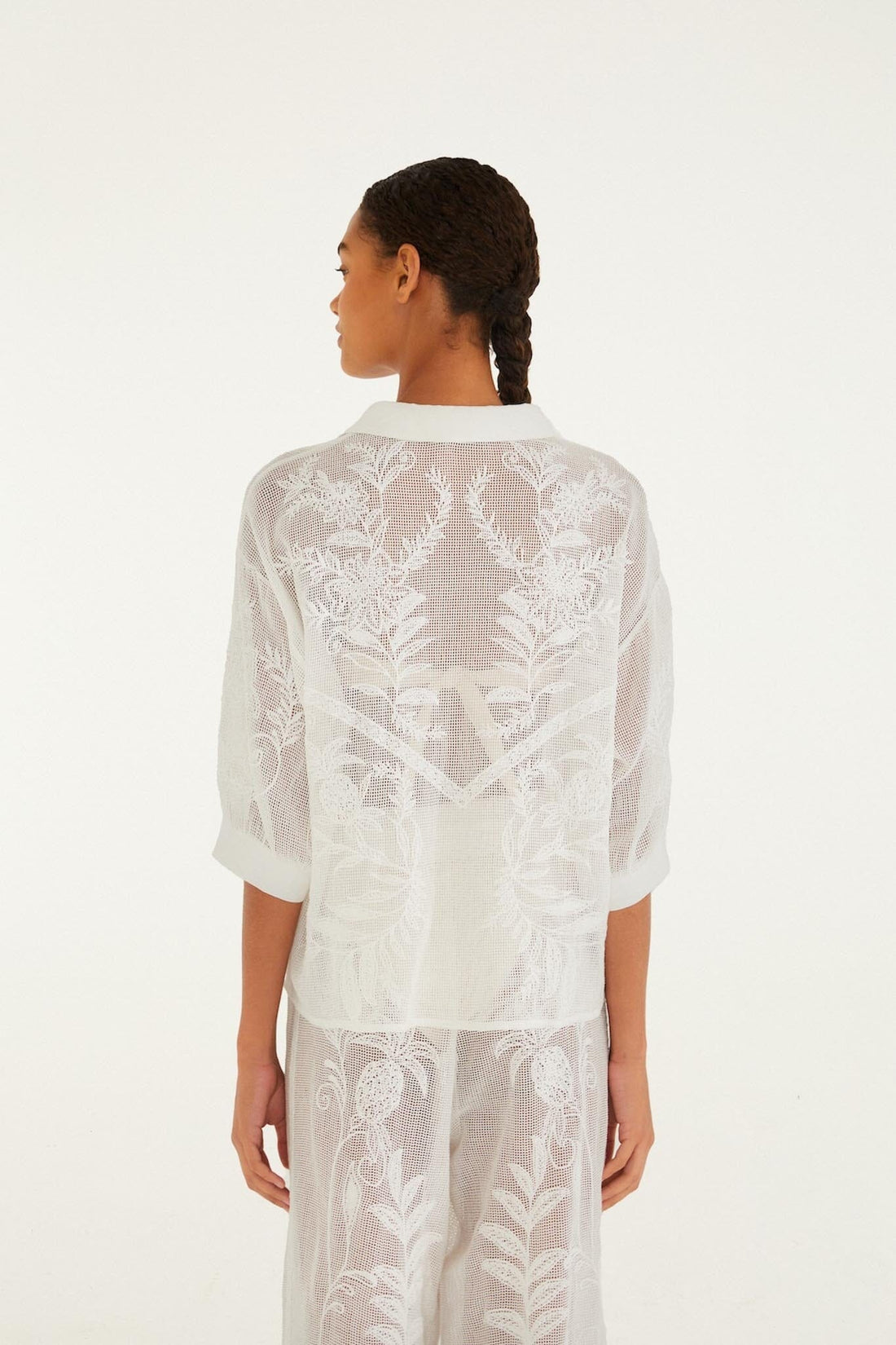nina blusa blanca roto
