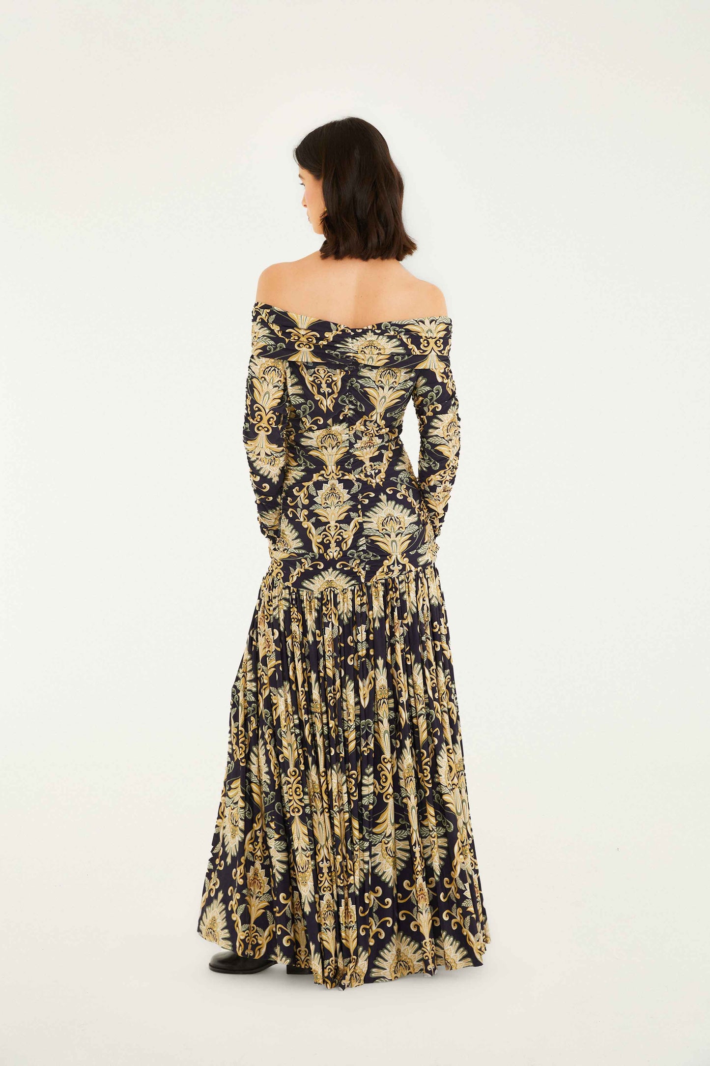 FARM Rio model wearing the Navy Blue Wonderful Arabesque Off-Shoulder Maxi Dress